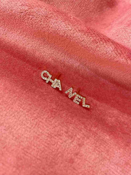 CHANEL LETTER STUD image 0