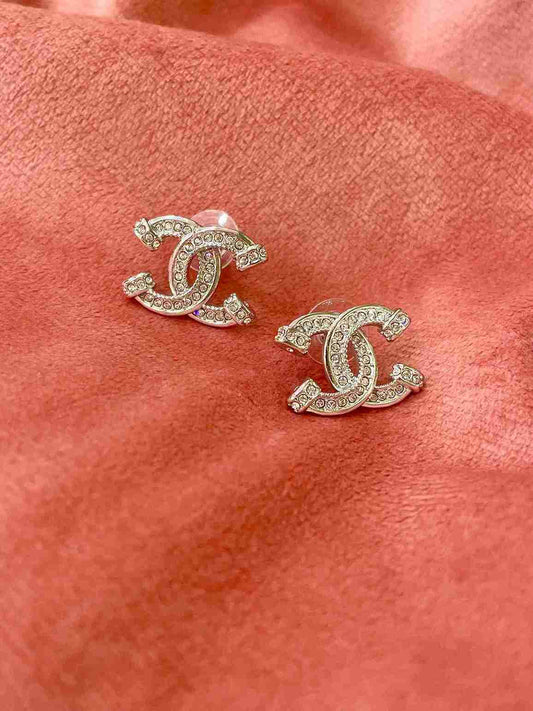 CHANEL SILVER STUD image 0