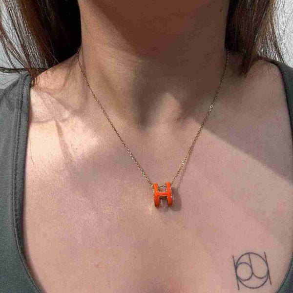 HERMES ORANGE PENDENT
