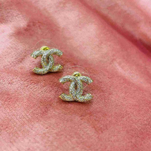 CHANEL TWISTED GOLD STUD